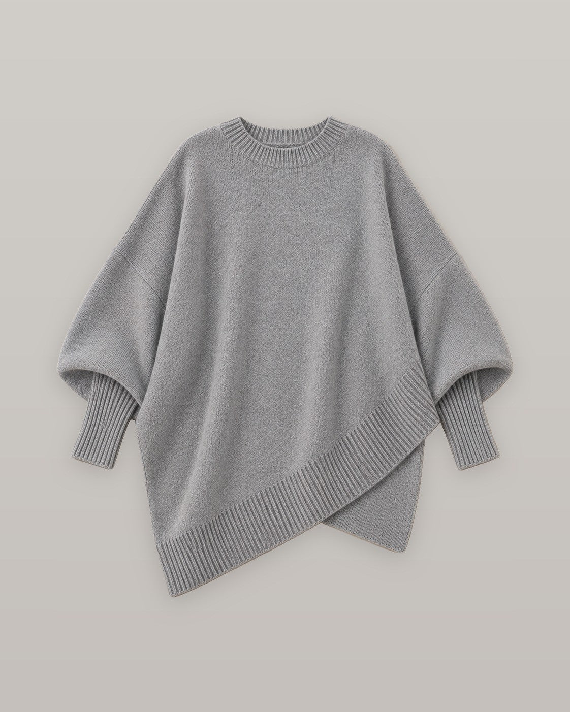 Draped asymmetric knit poncho in gray, flat lay