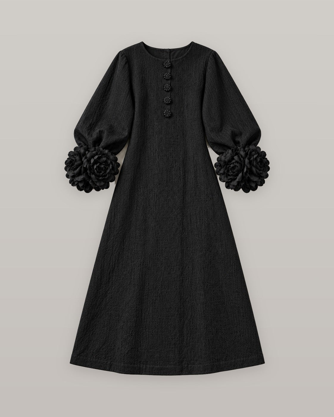 Midi dress with rose-cuff sleeves in black, flat lay