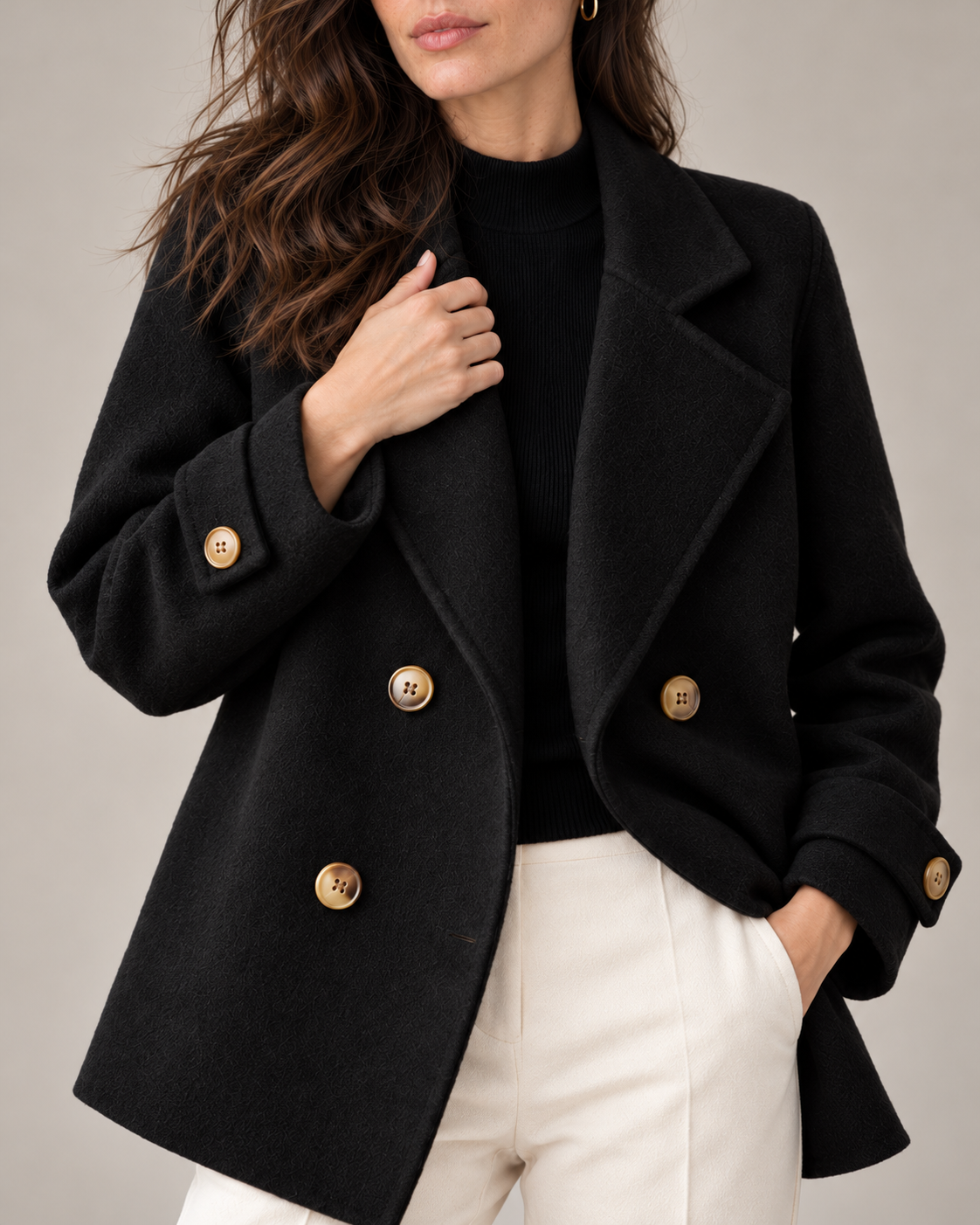 Tiara double-breasted coat in black, close-up detail